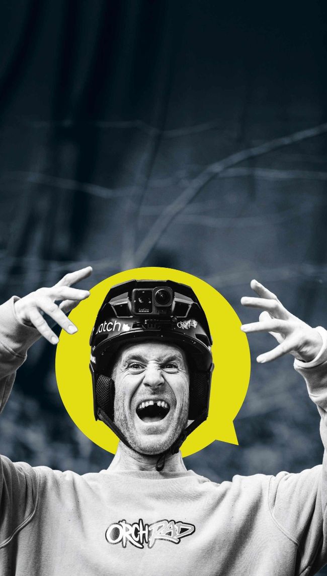 Sam Pilgrim celebrating in helmet with GoPro, arms raised, screaming