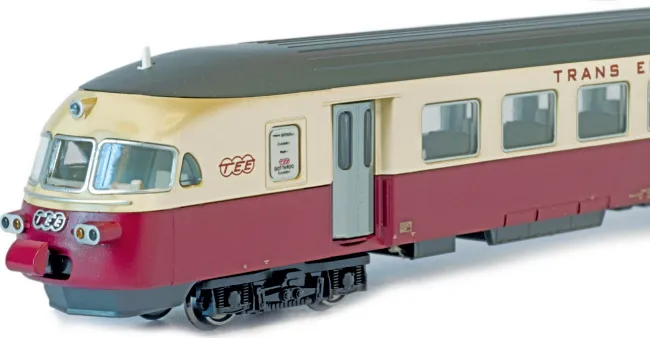 Close-up of the Kato SBB RAe II TEE power car nose end showing the distinctive curved front and TEE logo in red and cream.